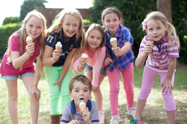 Children eating ice cream in Bangor-on-Dee